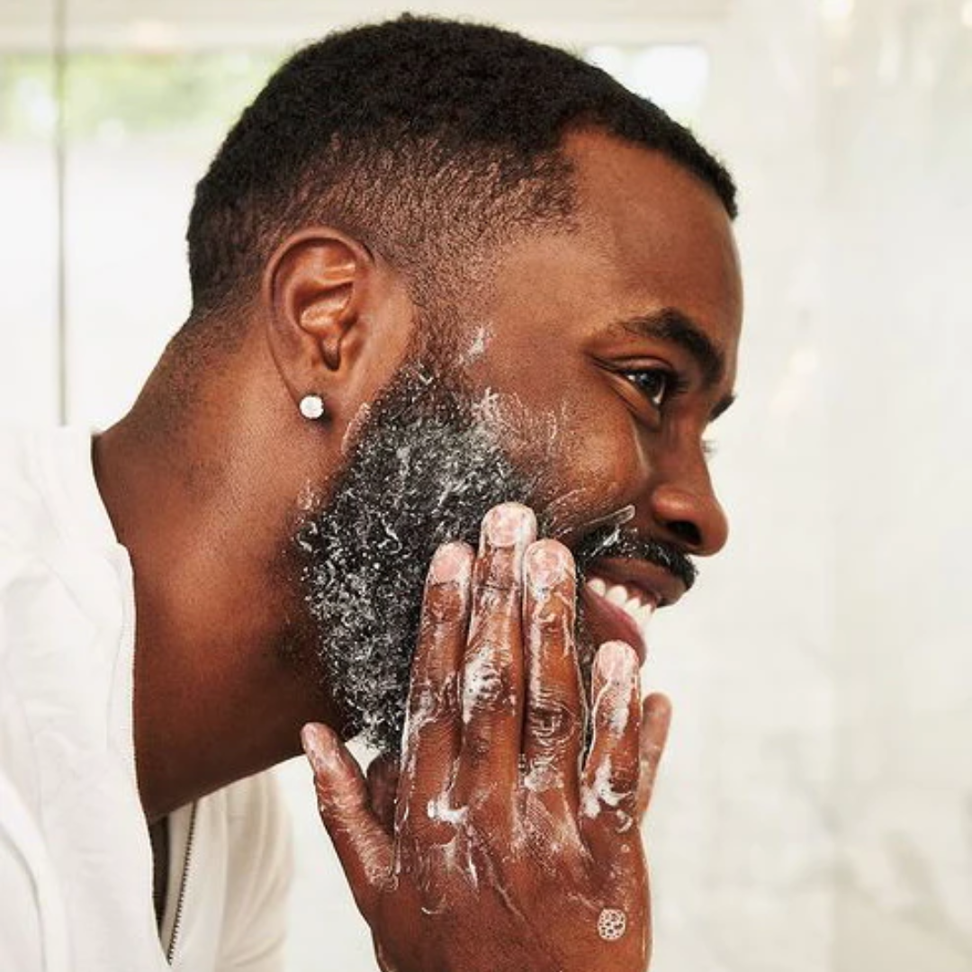 black man washing beard